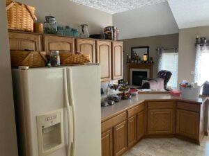 Before picture of an outdated kitchen